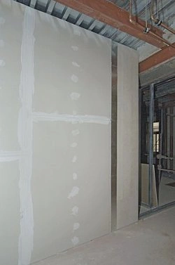 Drywall installation in construction site