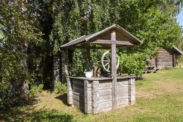 Wooden well with roof
