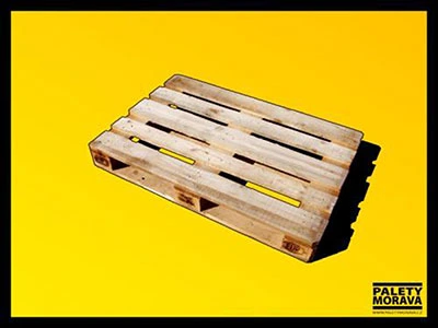 Wooden pallet on yellow background